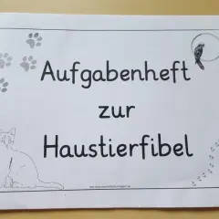 Aufgabenheft zur Haustierfibel für die Grundschule. Mit Katzen- und Vogelbildern.
