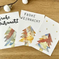 Drei selbstgebastelte Weihnachtskarten mit bunten Bäumen – tolle Ideen zum Weihnachtskarten basteln mit Kindern!