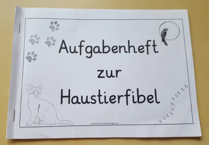 Aufgabenheft zur Haustierfibel für die Grundschule. Mit Katzen- und Vogelbildern.